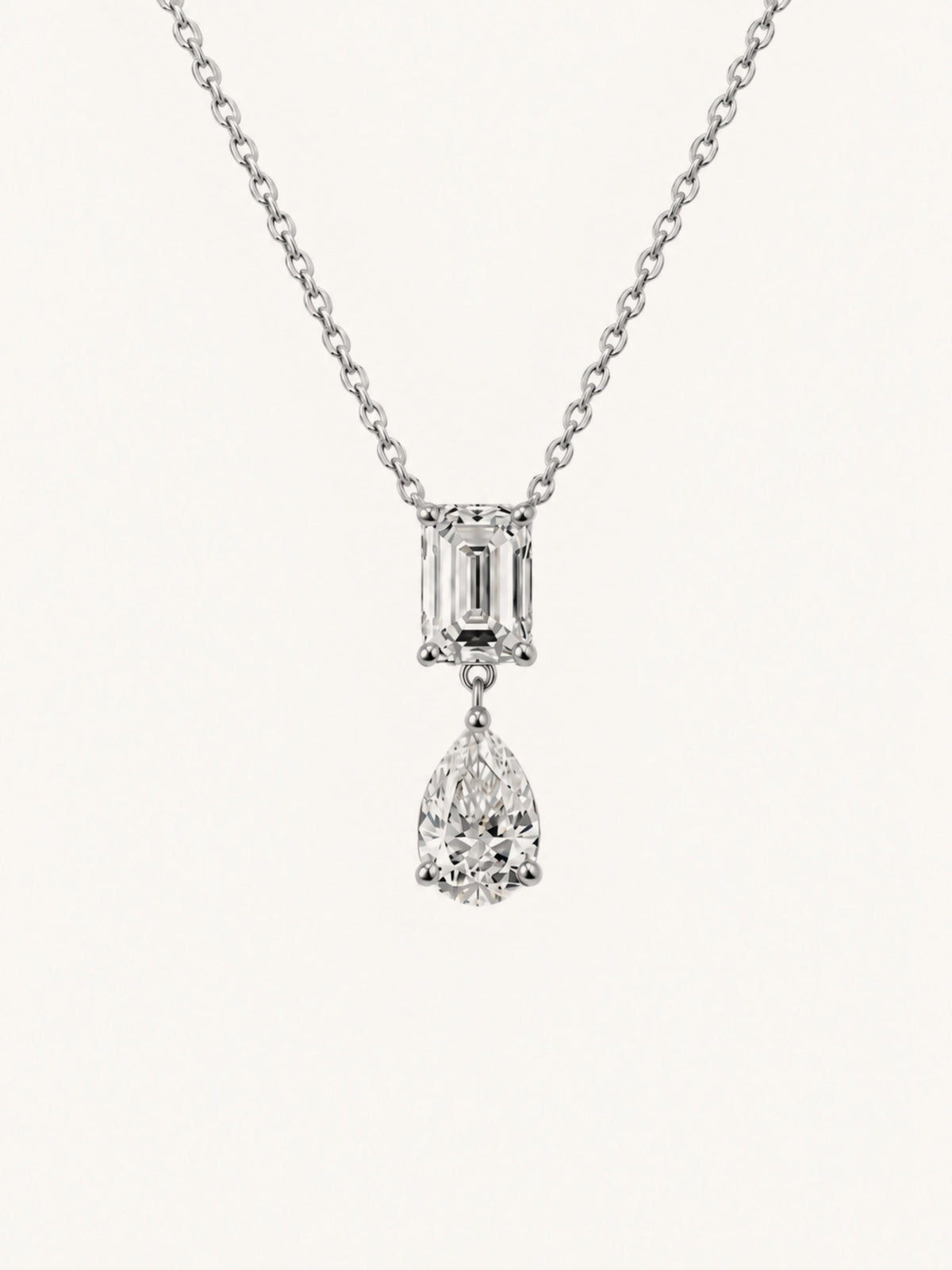 Emerald cut and pear lab diamond pendant necklace in 14k white gold