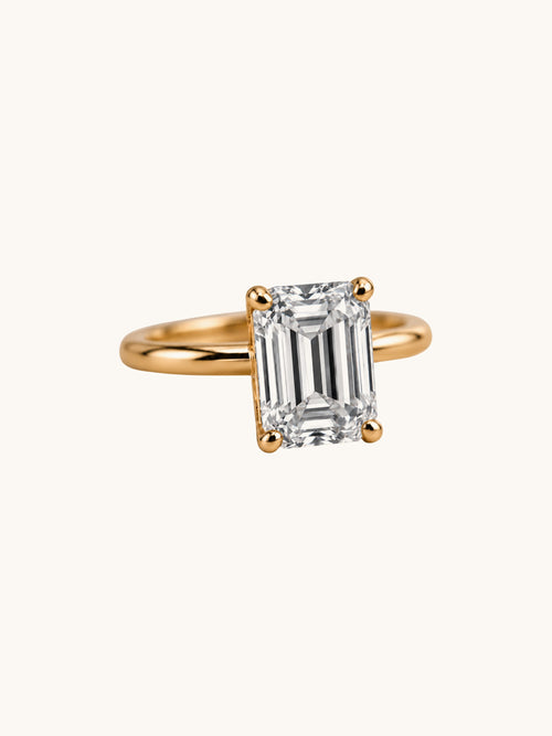 Emerald cut lab diamond ring in 14k yellow gold