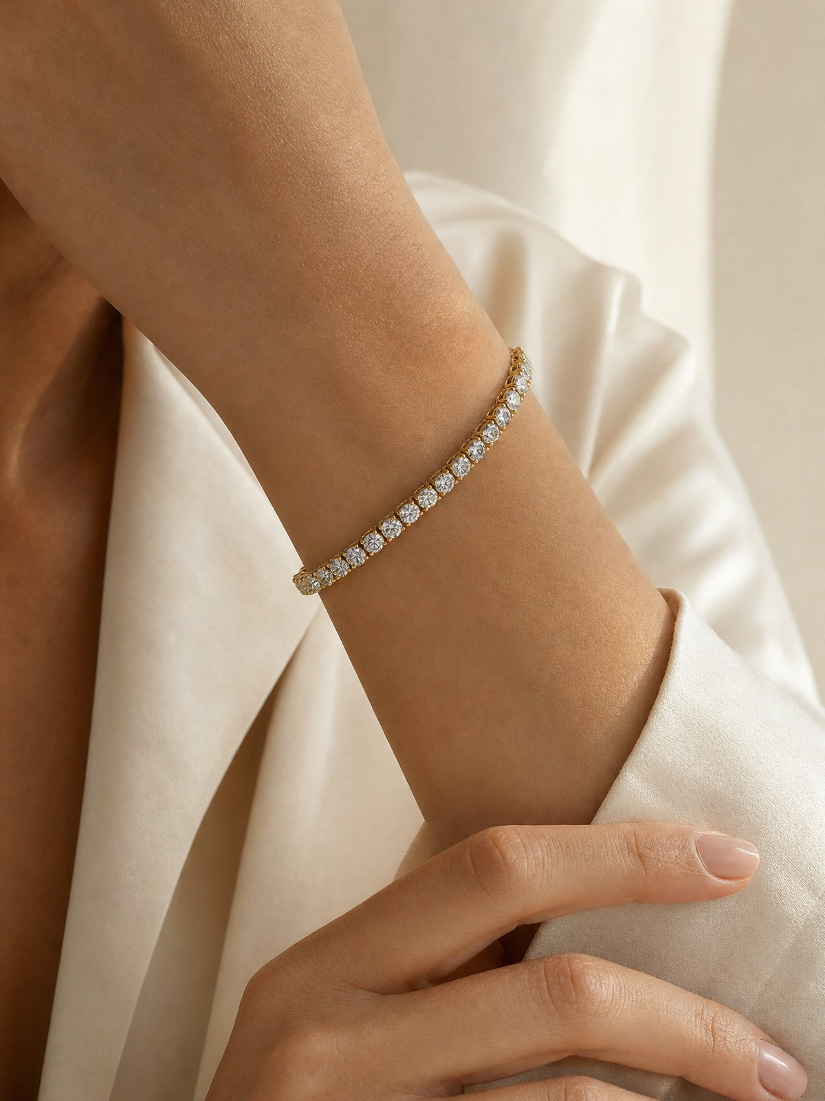 Round lab diamond tennis bracelet worn on wrist